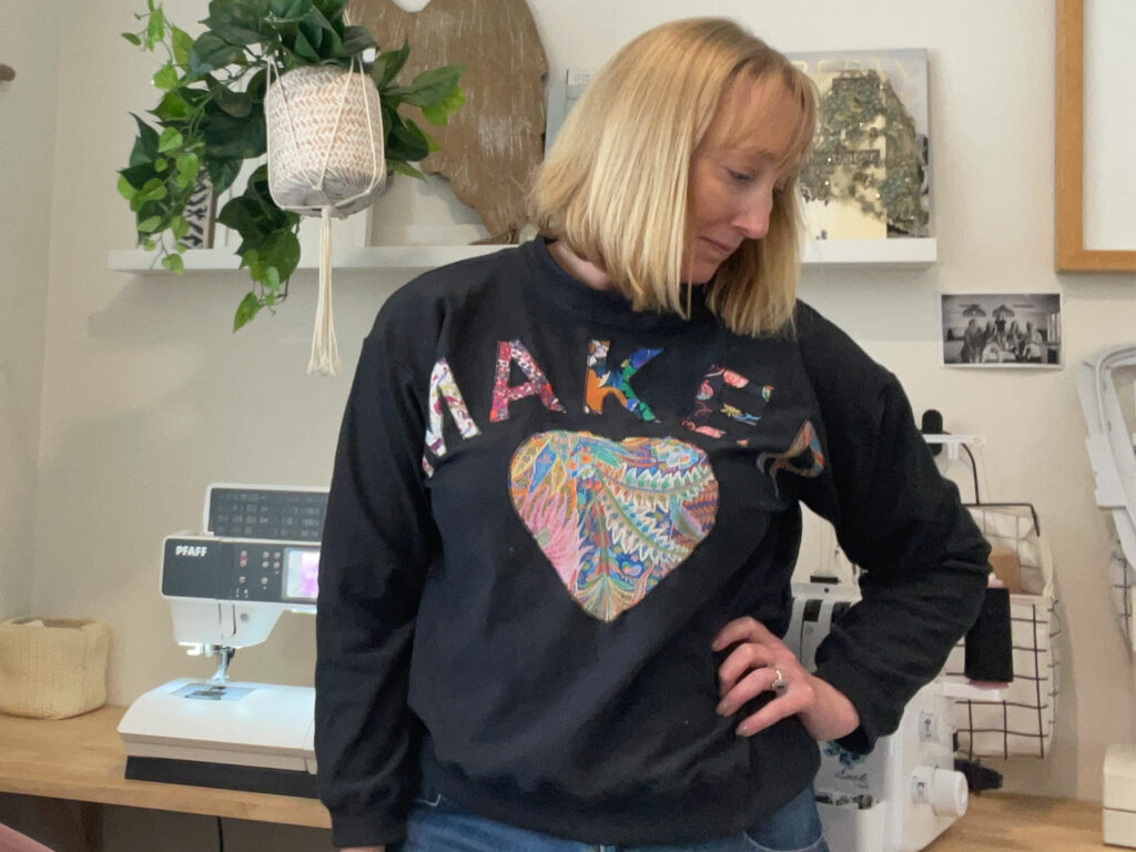the maker sweater on a model