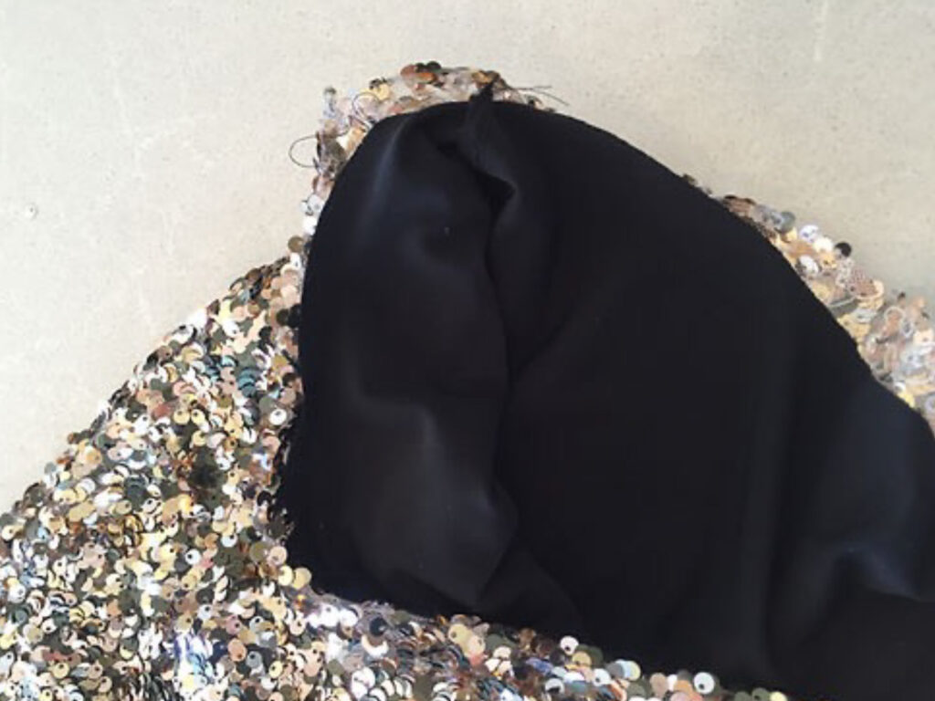 inserting lining into sequin fabric
