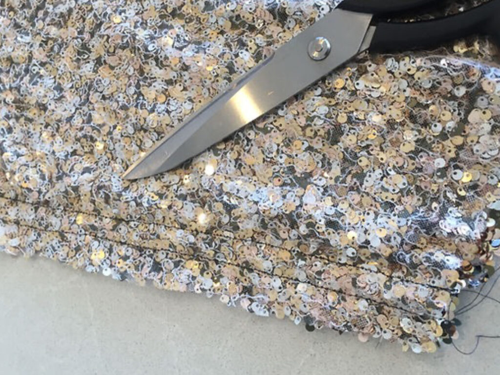 close up of seam in sequin fabric